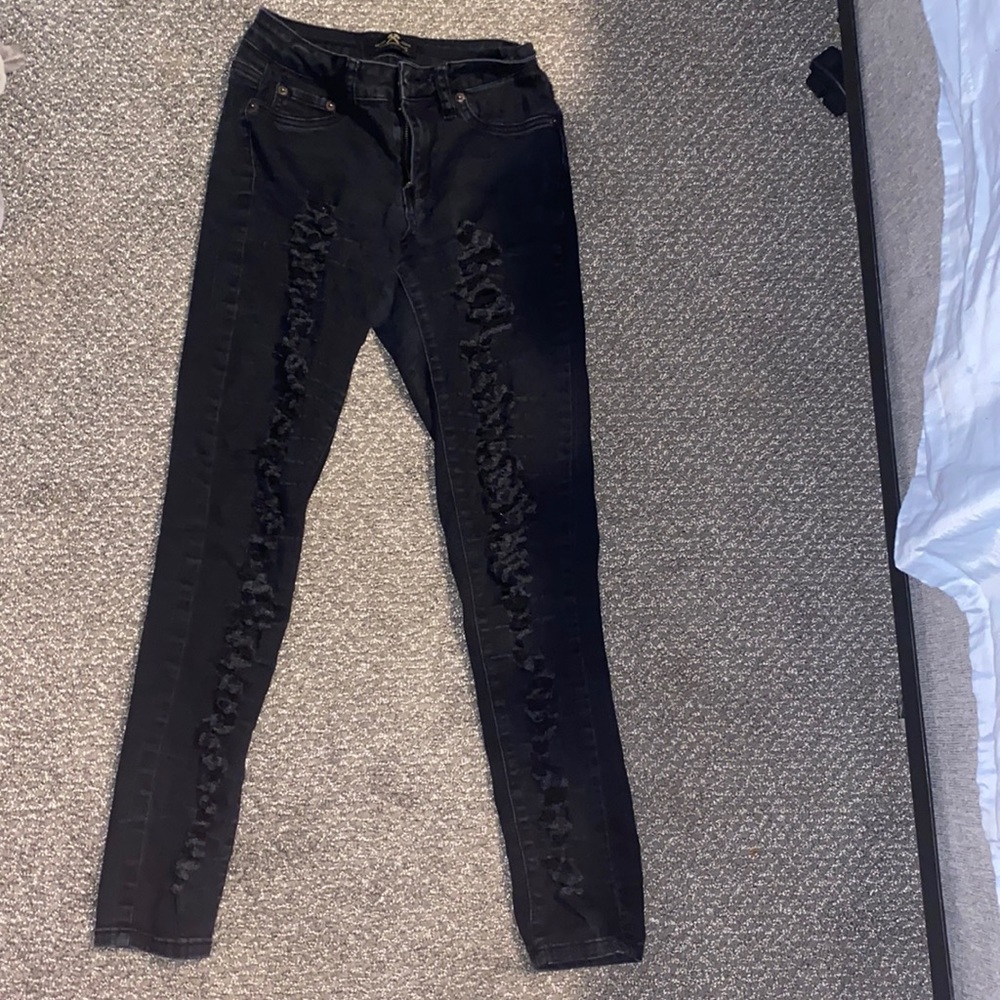 Low rise black ripped jeans